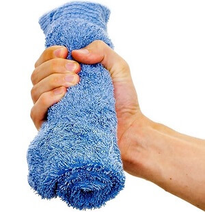Golfers Elbow Exercises: Towel Clench for improving grip strength Golfers Elbow Exercises: Towel Clench for improving grip strength